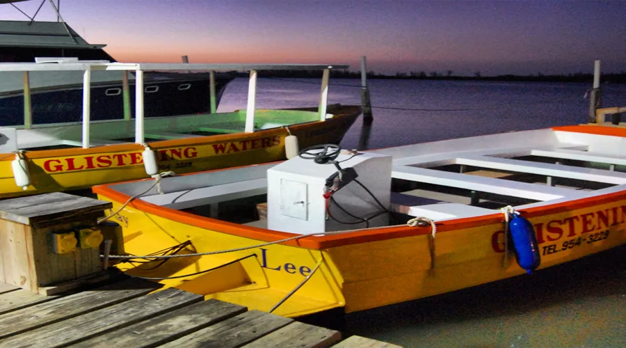 Tour boats prepared for an evening Luminous Lagoon trip