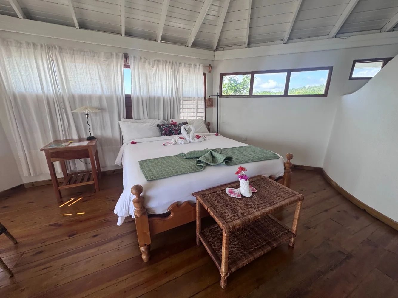 King bedroom with tropical details — Starbright, Coral Cove Wellness Resort